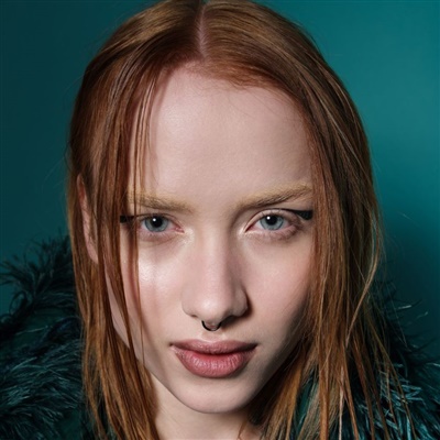 LIZA K.